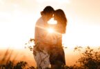 Couple Standing Beside Plants during Golden Hour