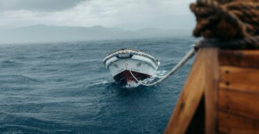 A boat in the middle of a large body of water
