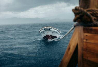 A boat in the middle of a large body of water