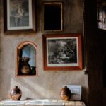 A room that has a bunch of pictures on the wall