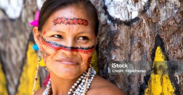 Native Brazilian woman portrait at an indigenous tribe in the Amazon